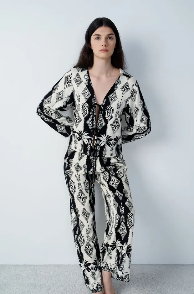 NALANI - Wide patterned pajama pants 6550563